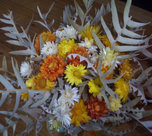 Paper daisies in floral arrangements